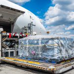 Air,Cargo,Logistic,Containers,Are,Loading,To,An,Airplane.,Air